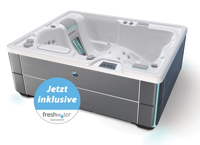 Foto eines Whirlpool mit einer grauen Außenverkleidung und mit einer Wanne in Alpinweiß